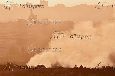 An Israeli tank manoeuvres in Gaza