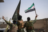 Syrian Democratic Forces (SDF) fighters convoy leaves Aleppo