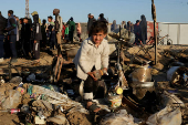 Aftermath of an Israeli strike on a tent camp sheltering displaced people, in Khan Younis