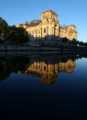 Sunlight illuminates the Reichstag building, the seat of the German parliament, in Berlin