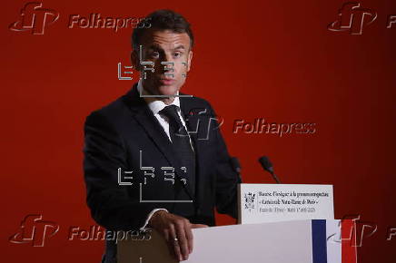 Macron hosts decoration ceremony for restorer of Notre-Dame Cathedral
