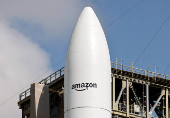 A United Launch Alliance Atlas V rocket is shown on its launch pad carrying Amazon's Project Kuiper internet network satellites as the vehicle is prepared for launch