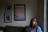 Jenna Norton, an employee at the National Institute of Diabetes and Digestive and Kidney Diseases, sits for a portrait in Bethesda, Maryland