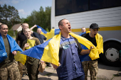 Ukrainian POWs are seen after a swap at an unknown location in Ukraine