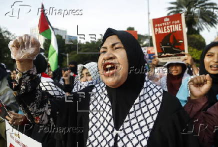 Pro Palestinians protest outside the US embassy in Jakarta