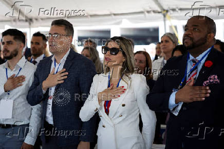 Naturalization ceremony for new U.S. citizens aboard USS New York in Fort Lauderdale