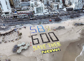 A drone view shows Israeli protesters display the words 
