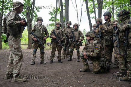 Foreign volunteers of the Ukrainian National Guard brigade attend military exercises at a training ground near a front line in Kharkiv region