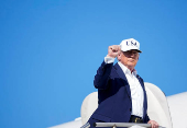 U.S. President Donald Trump boards Air Force One at Morristown Airport