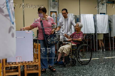 Voters cast their ballots in recall election for several Taiwanese legislators
