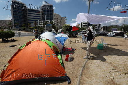 Pro-Palestinian demonstrators pitch protest camp in front of US embassy in Tunis