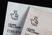 Photo illustration of EuroMillions lottery ticket