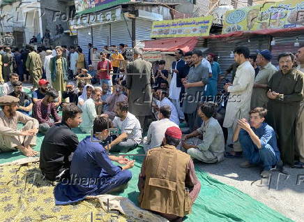 Mass funeral of 8 volunteers killed in a landslide near the Chinese border in Gilgit