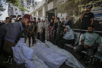 Palestinians mourn family killed in Israeli airstrike on Gaza refugee camp