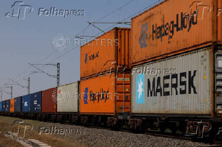 Containers are transported by train near the Deendayal Port in Kandla