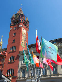 Flags flutter in front of the downhill during the Eurovision Song Contest in Basel