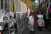 Evo Morales supporters march in mourning amid economic crisis, in La Paz