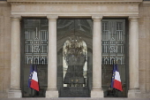 Macron hosts decoration ceremony for restorer of Notre-Dame Cathedral