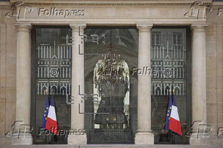 Macron hosts decoration ceremony for restorer of Notre-Dame Cathedral