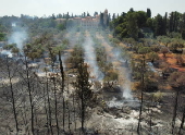 Wildfires burn in the Jerusalem hills, central Israel