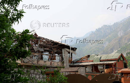 A damaged portion of Bilal Mosque is seen after it was hit by an Indian strike in Muzaffarabad