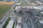 Rescuers work at the explosion site at a chemical plant in Gaomi