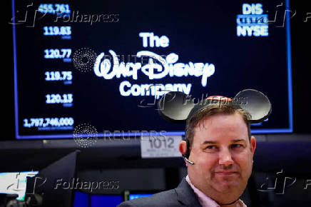 Traders work on the floor of the NYSE in New York