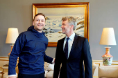 Denmarks King Frederik greets Greenland's new Prime Minister Jens-Frederik Nielsen at Amalienborg Palace in Copenhagen