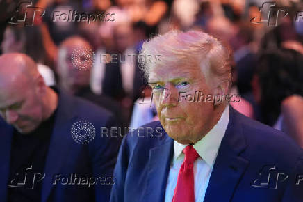 U.S. President Donald Trump attends the UFC-316 mixed martial arts event, in Newark