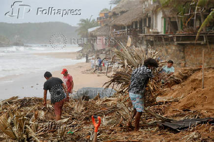 Erick weakens to tropical storm over Mexico, leaves trail of damage