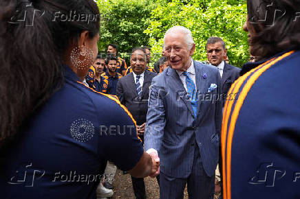 King Charles III meets members of the India men's and women's Test cricket teams in London