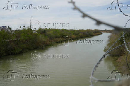 FILE PHOTO: The Rio Grande river, which acts as a natural border between the U.S. and Mexico, flows in Reynosa