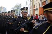 El Salvador's President Nayib Bukele delivers a speech to mark the first year of his second term in office, in San Salvador