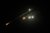 Missiles launched from Iran are intercepted, as seen from the city of Ashkelon