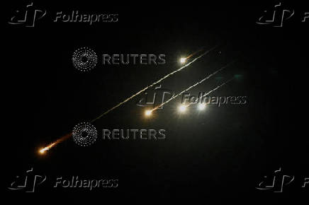 Missiles launched from Iran are intercepted, as seen from the city of Ashkelon