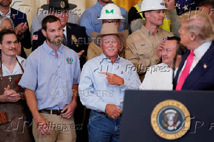U.S. President Donald Trump holds a 