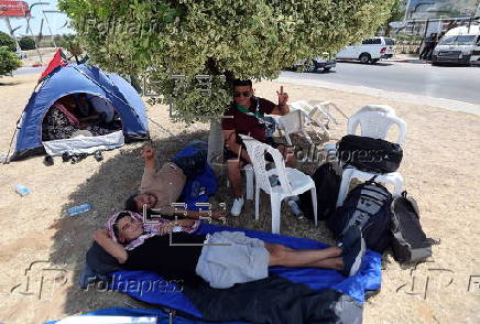 Pro-Palestinian demonstrators pitch protest camp in front of US embassy in Tunis
