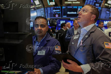 Traders work on the floorat the New York Stock Exchange (NYSE) in New York City