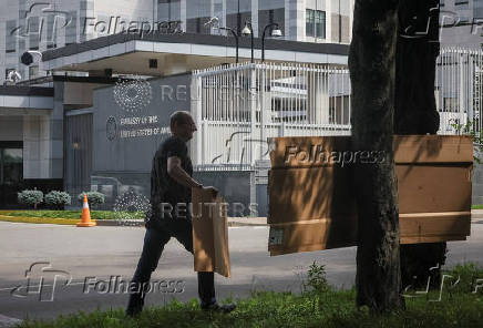 An activist takes part in a rally in front of the U.S. embassy in Kyiv