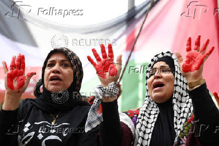 Pro-Palestinian protesters gather outside the foreign ministry, in Berlin