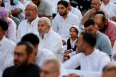 Palestinians from Gaza attend Eid al-Adha prayers, at Al Thumama Complex,  in Doha