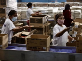 President Ferdinand Marcos visits a relief goods warehouse in Manila as Tropical Storm 'Crising apporaches
