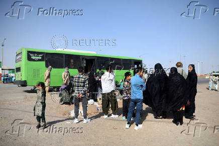 Afghan nationals deported from Iran arrive at the Islam Qala border crossing