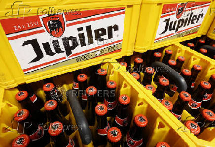 Bottles of Belgian beer Jupiler are displayed for sale at a supermarket in Sint-Pieters-Leeuw