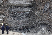 Rescuers search for survivors after signs of life detected under Bangkok building rubble