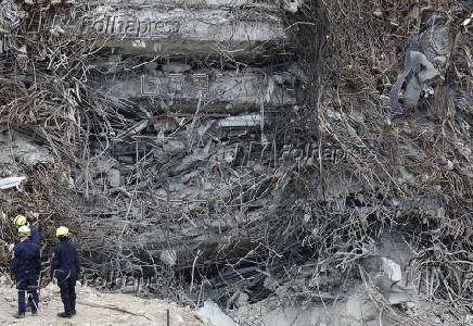 Rescuers search for survivors after signs of life detected under Bangkok building rubble