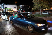 Jordanians celebrate after Jordan qualified for the World Cup for the first time, winning 3-0 over Oman, in Amman