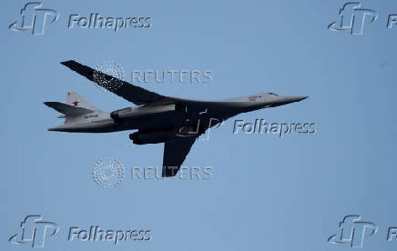 FILE PHOTO: Russian Tu-160 Supersonic Bomber flies during a military parade marking the Belarus Independence Day in Minsk