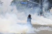 Protesters and federal agents clash after ICE raid in Paramount