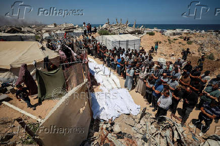 Palestinians mourn loved ones from Azzam family in Gaza City